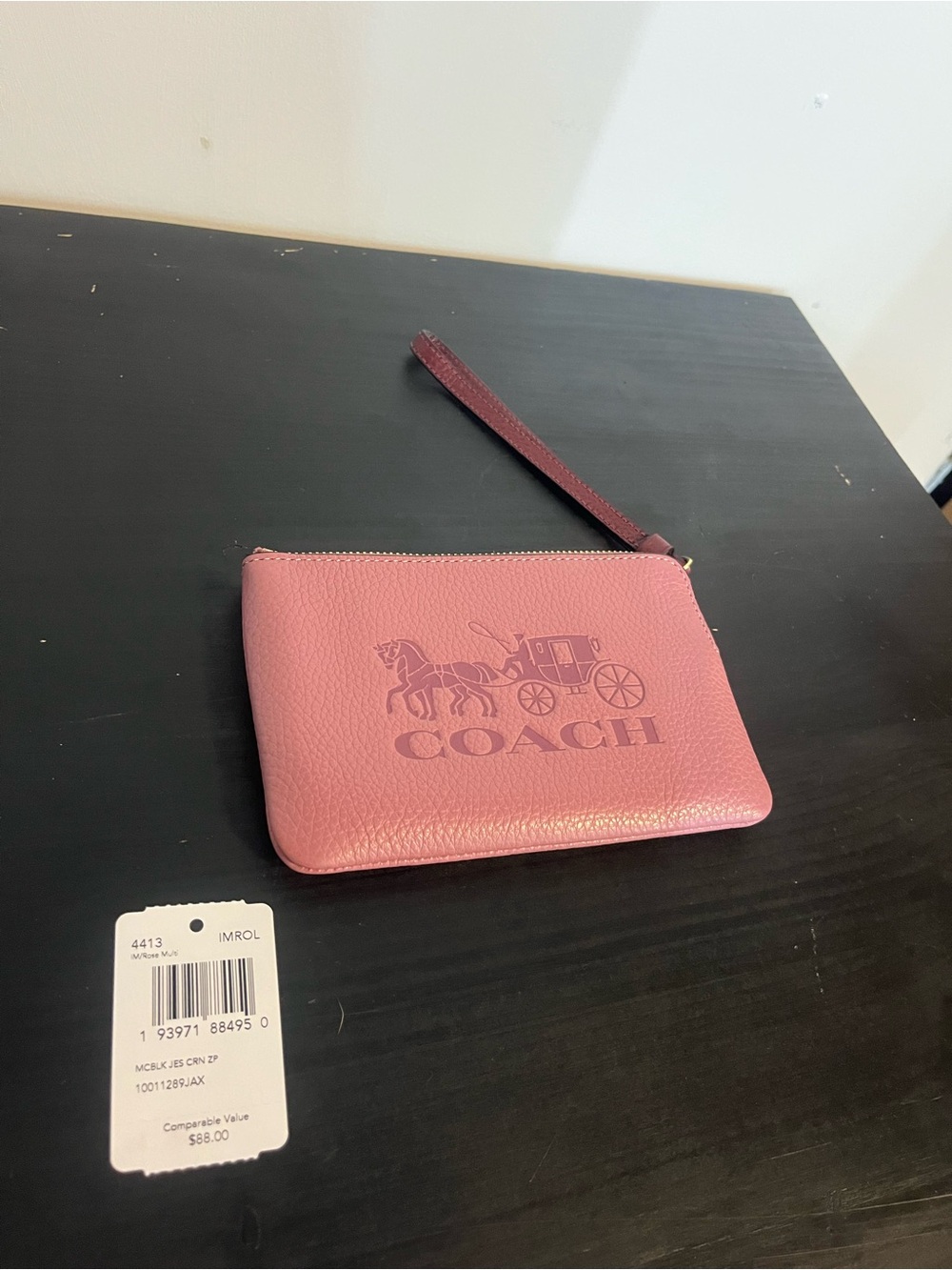 Coach Dusty Rose Leather Wristlet with Horse & Carriage Logo